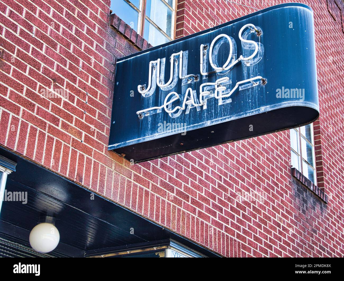 Julios Cafe vintage neon sign Stock Photo