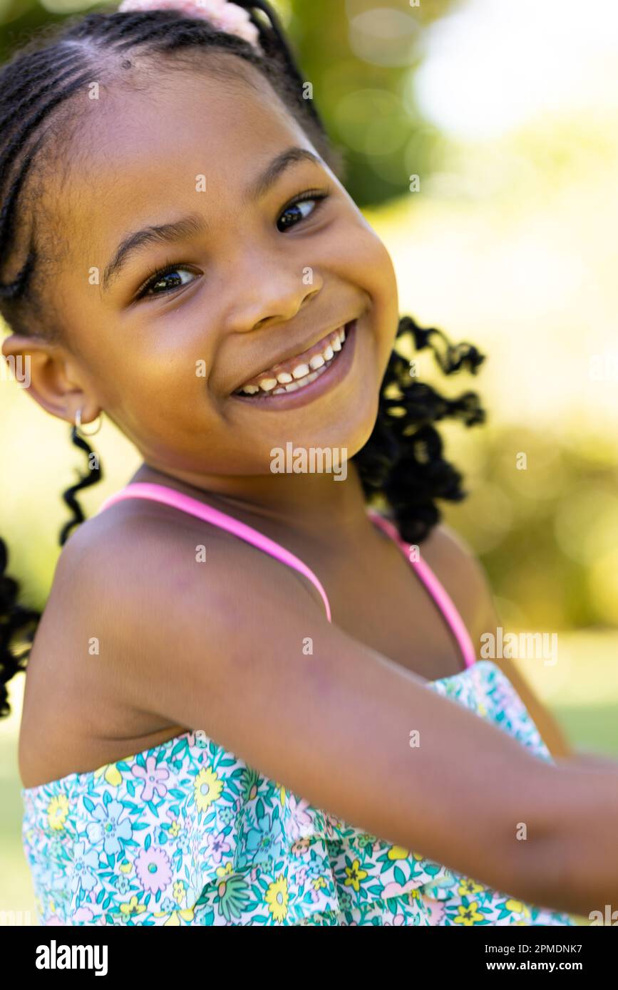 Closeup portrait of cute african american smiling girl looking at ...