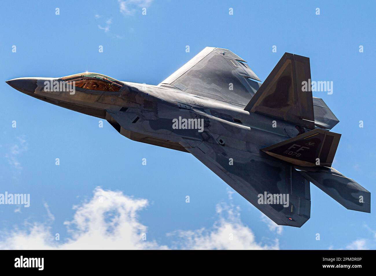 U.S. AIR FORCE ACADEMY, Colo. – Two F-22 Raptors perform a flyover and ...