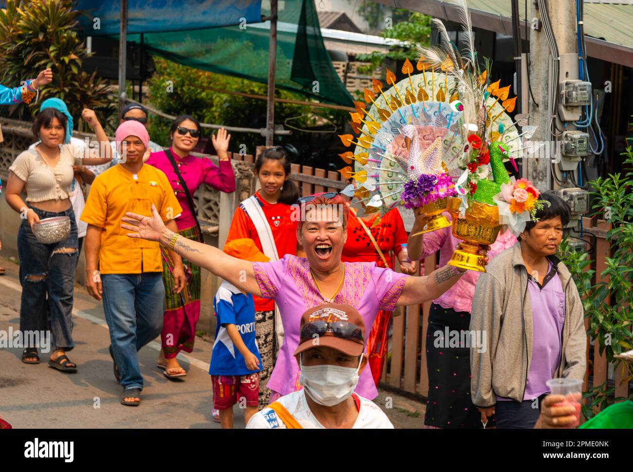 Pai,Mae Hong Son,Thailand-April 4th 2023:Crowds of people parade the ...