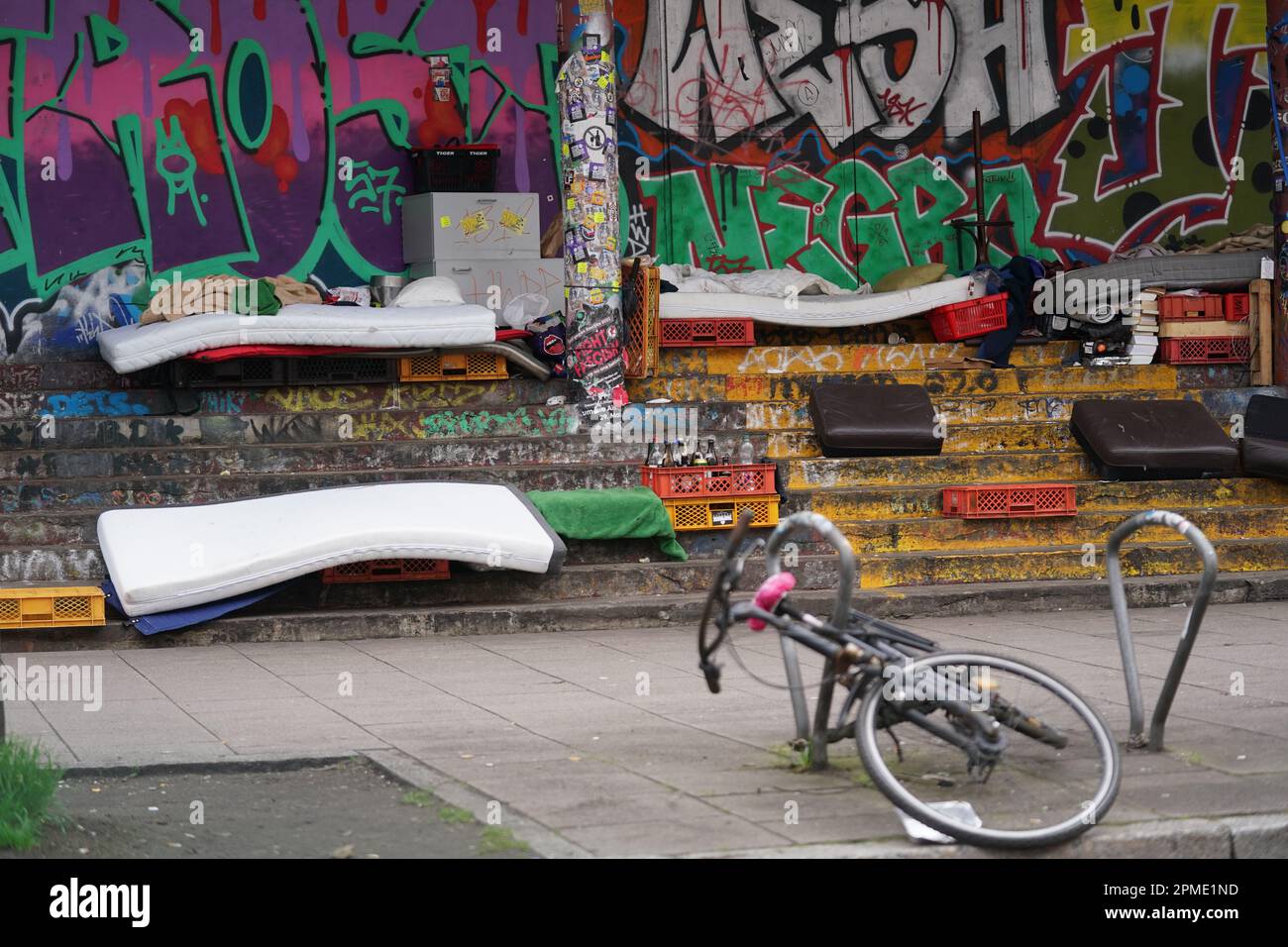 Hamburg, Germany. 12th Apr, 2023. Mattresses lie on the steps in front