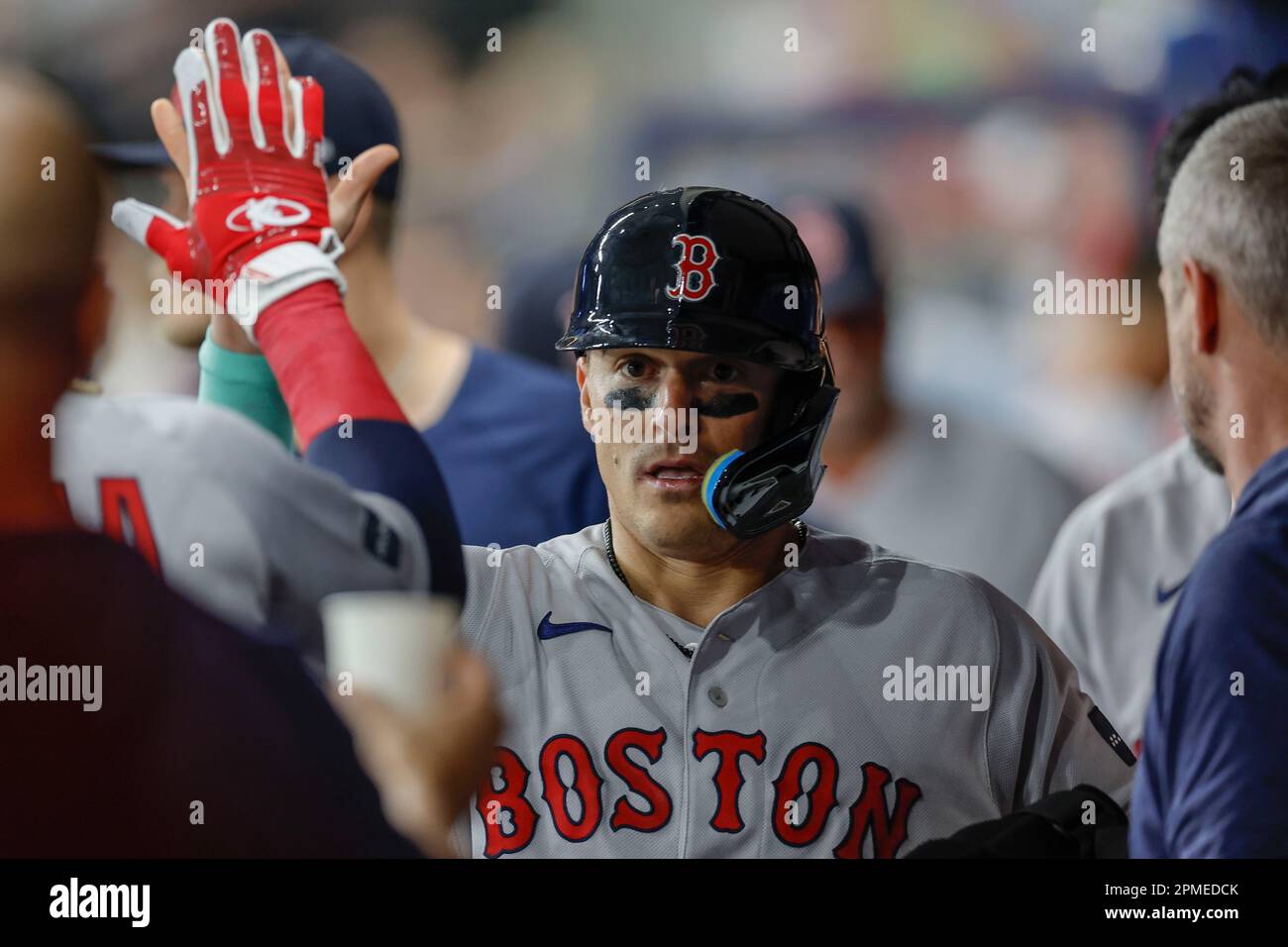 St. Petersburg, FL USA; Boston Red Sox shortstop Enrique Hernandez (5) homers and is congratulated in the dugout during an MLB game against the Tampa Stock Photo
