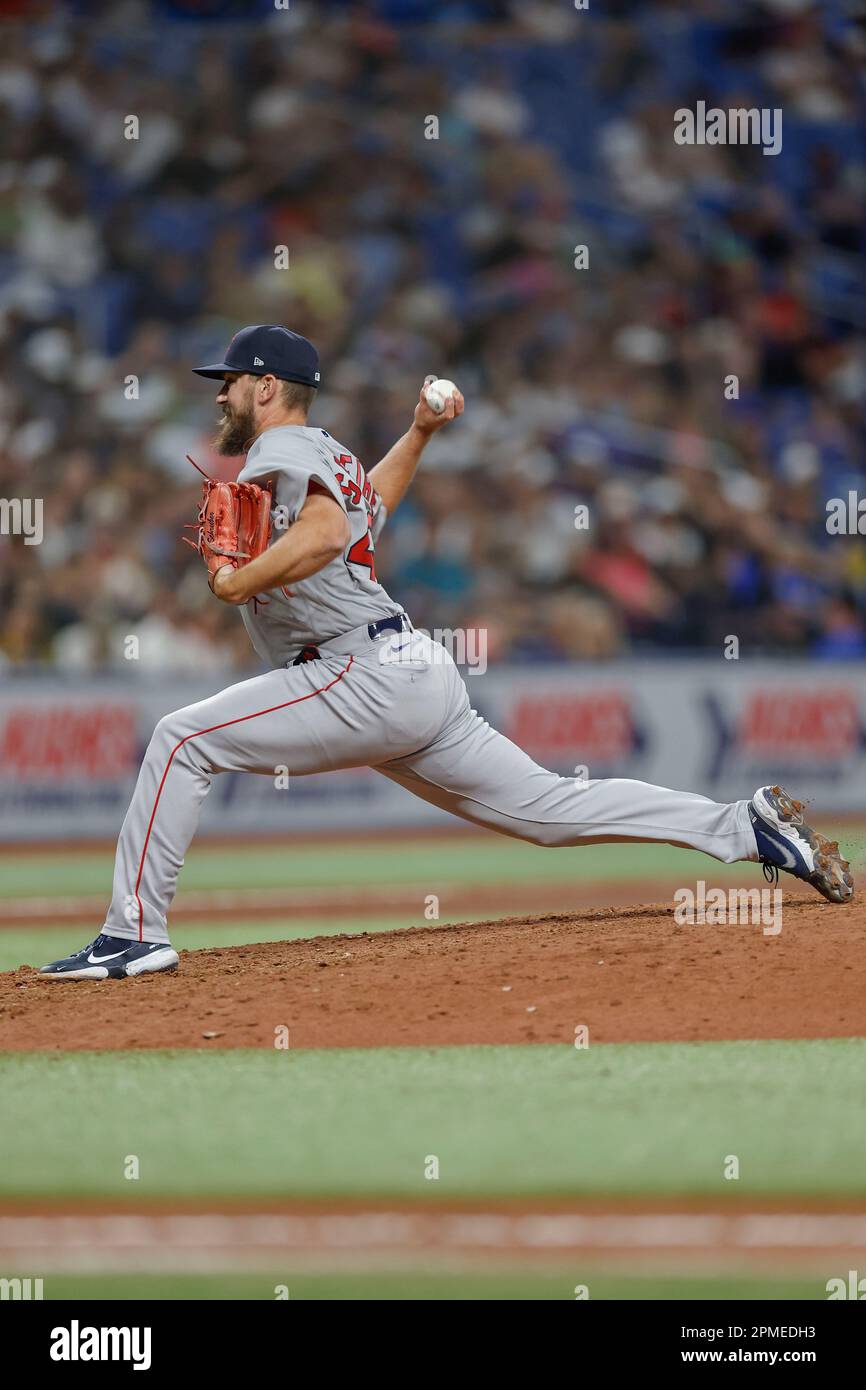 St. Petersburg, FL. USA; Boston Red Sox center fielder Enrique Hernandez  (5) hits a double during the ALDS Game 2 against the Tampa Bay Raysat  Tropicana Field, Friday, October 8, 2021. The