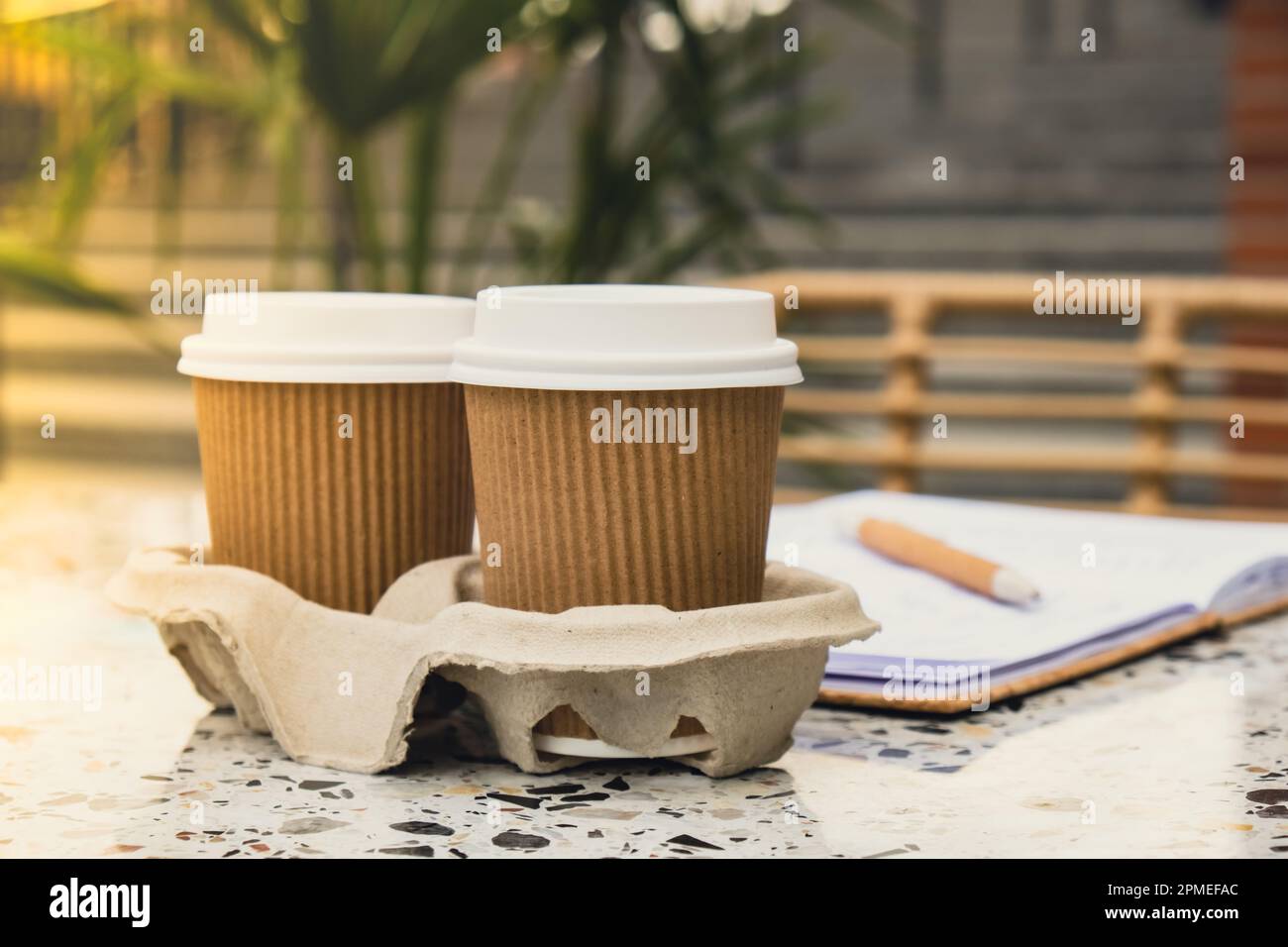 File:Hot Stopper in the lid of a paper coffee cup with a cardboard