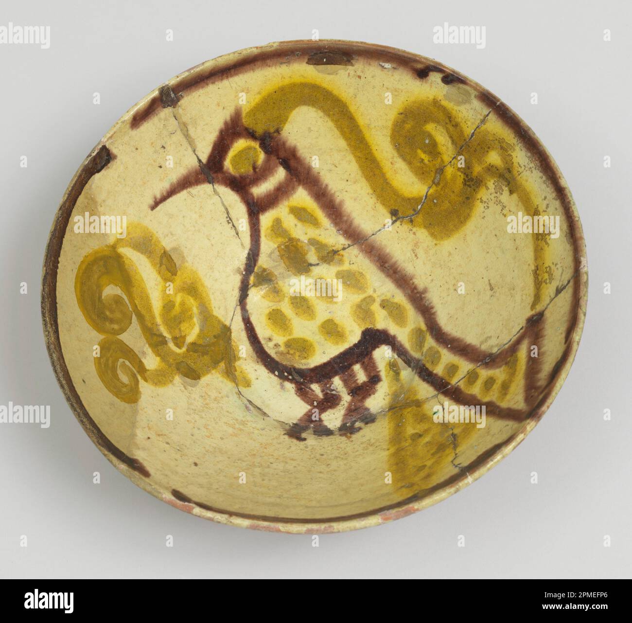 Bowl; wheel thrown earthenware, slip, underglaze painted in polychrome