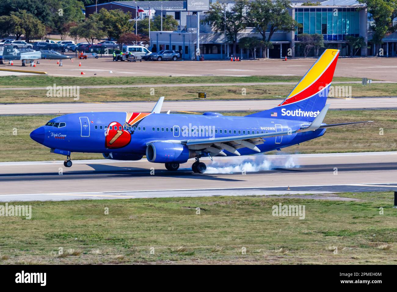 Dallas, United States – November 12, 2022: Southwest Boeing 737-700 airplane in the Triple Crown special livery at Dallas Love Field airport (DAL) in Stock Photo