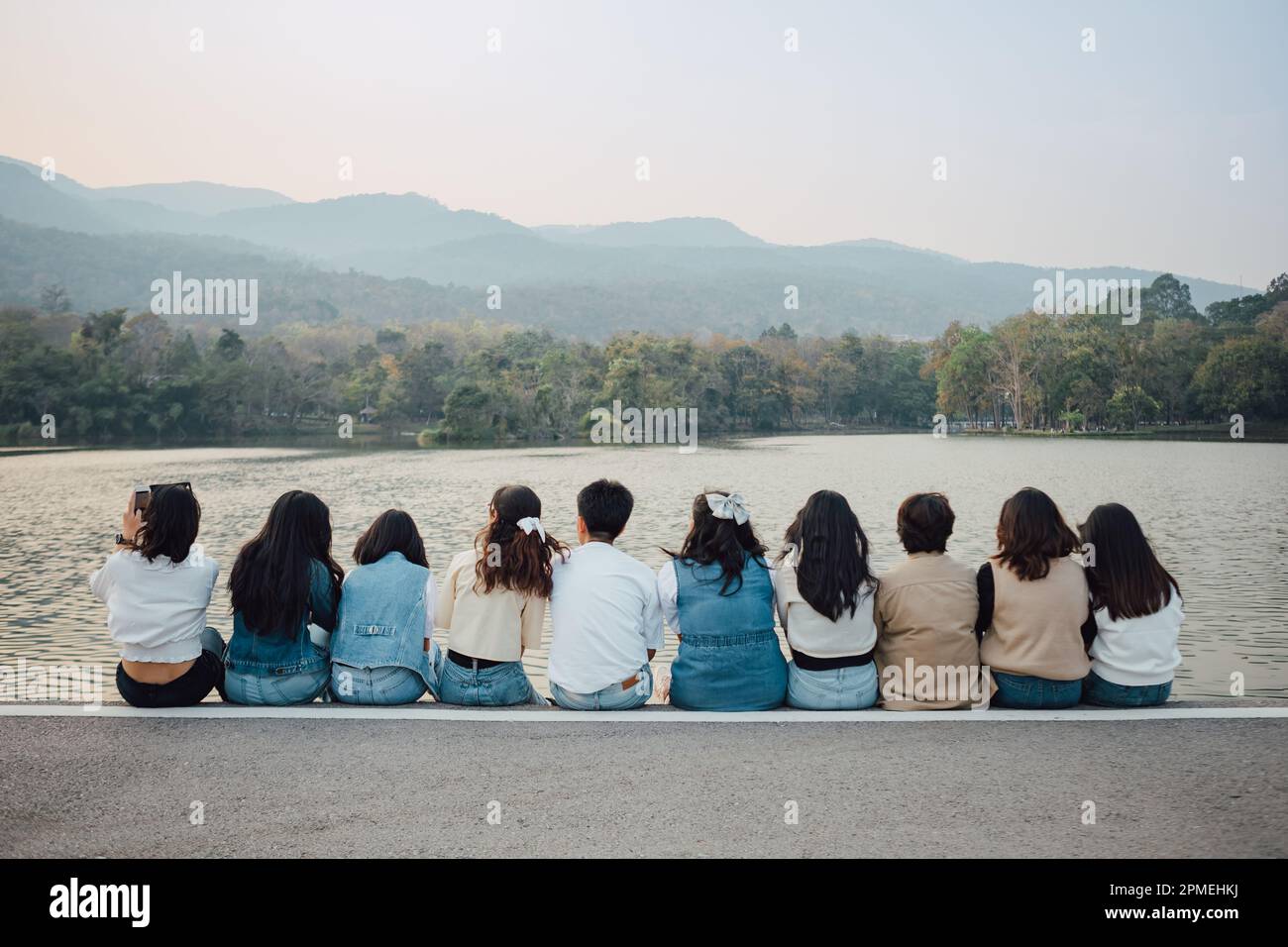 Groups of friends embrace each other together. Concept for kindness support  of people having fun with diversity millenials of gen z Stock Photo - Alamy