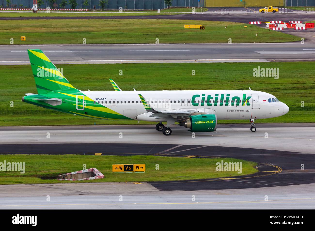 Changi, Singapore - February 3, 2023: Citilink Airbus A320neo airplane at Changi Airport (SIN) in Singapore. Stock Photo