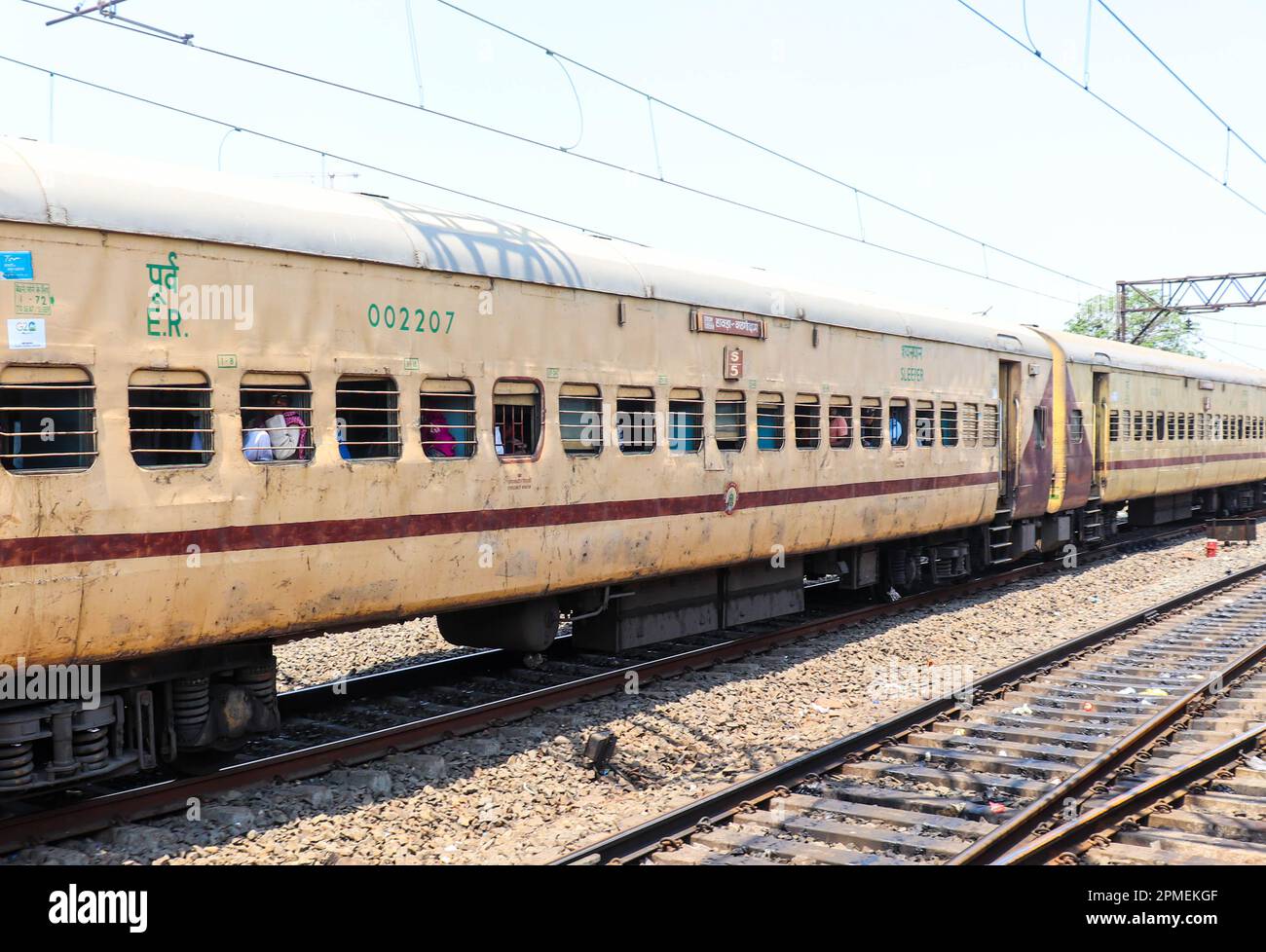 Indian Asian Train with rail track. Train with the rail line. Indian Railway Modern Train with Train Track and Electric Compartment. Travel Train. Stock Photo