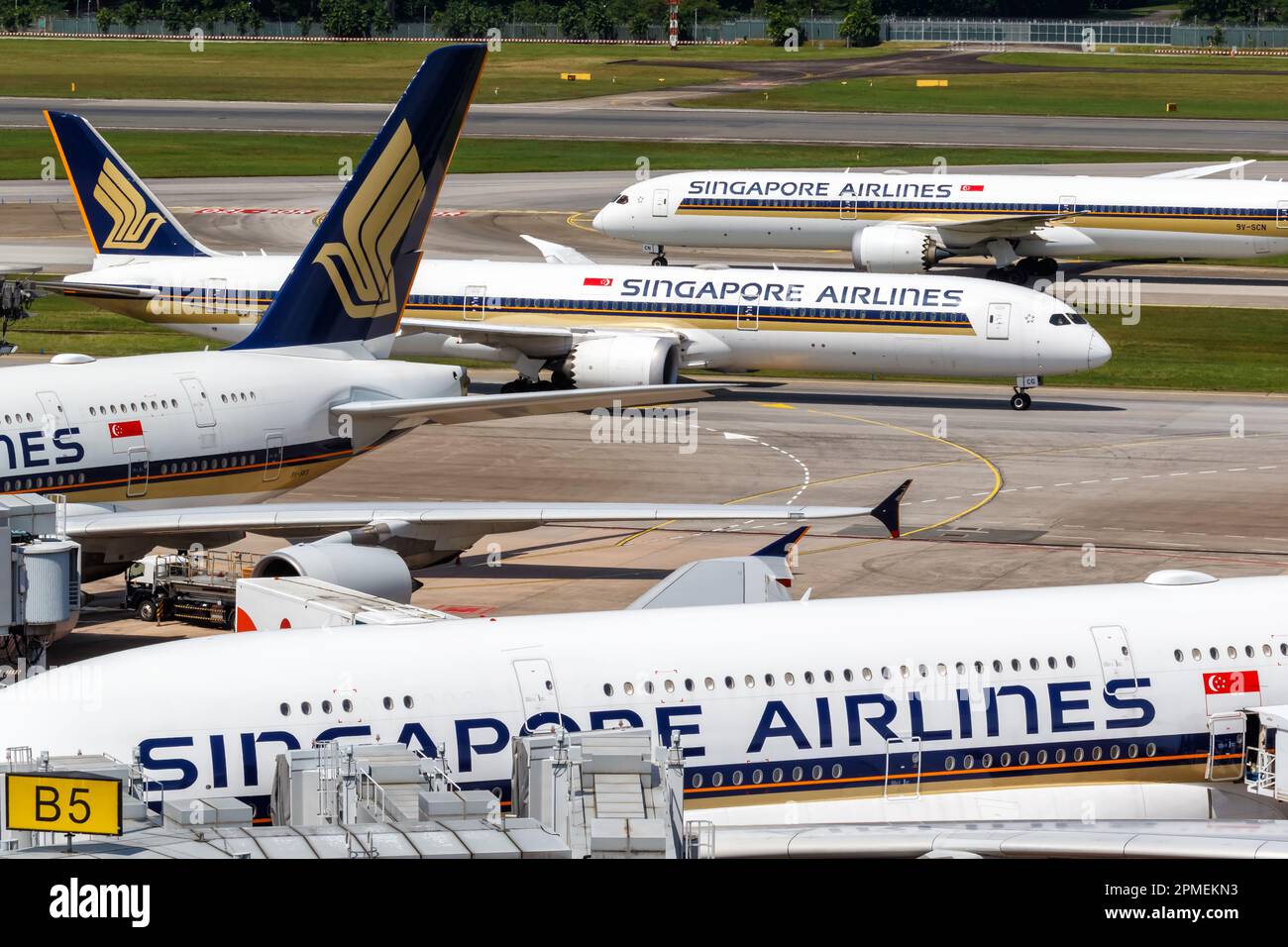 Changi, Singapore - February 3, 2023: Singapore Airlines airplanes at Changi Airport (SIN) in Singapore. Stock Photo
