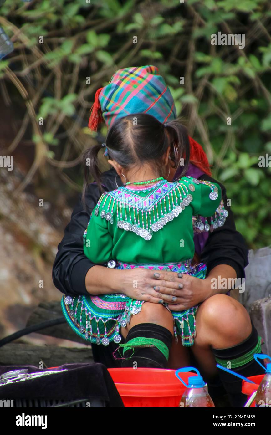 Sapa, Vietnam, lady from the Red Dao community The Yao people (its majority branch is also known as Mien); is a government classification for various Stock Photo