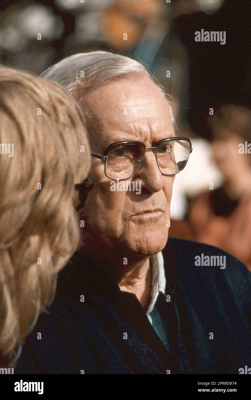 Patrick Victor Martindale White (28 May 1912 – 30 September 1990) was a British-born Australian writer who published 12 novels, three short-story collections, and eight plays, from 1935 to 1987. Here he is photographed at a political rally in 1975 in support of dismissed Australian Prime Minister, Gough Whitlam. Stock Photo