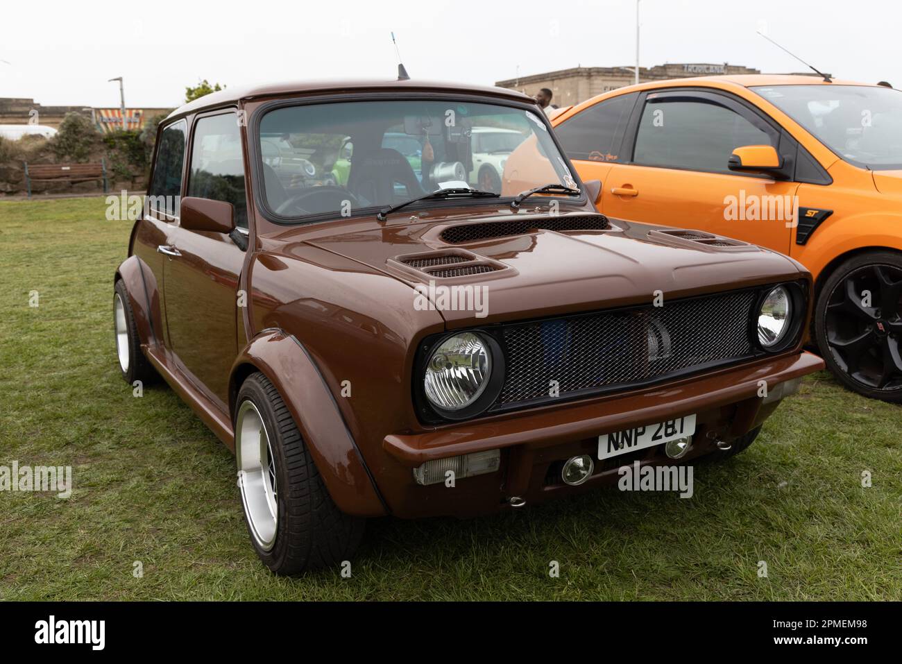 April 2023 - Classic brown Mini clubman car at the Pageant of Motoring on the Lawns at Weston super Mare, in North Somerset, UK. Stock Photo