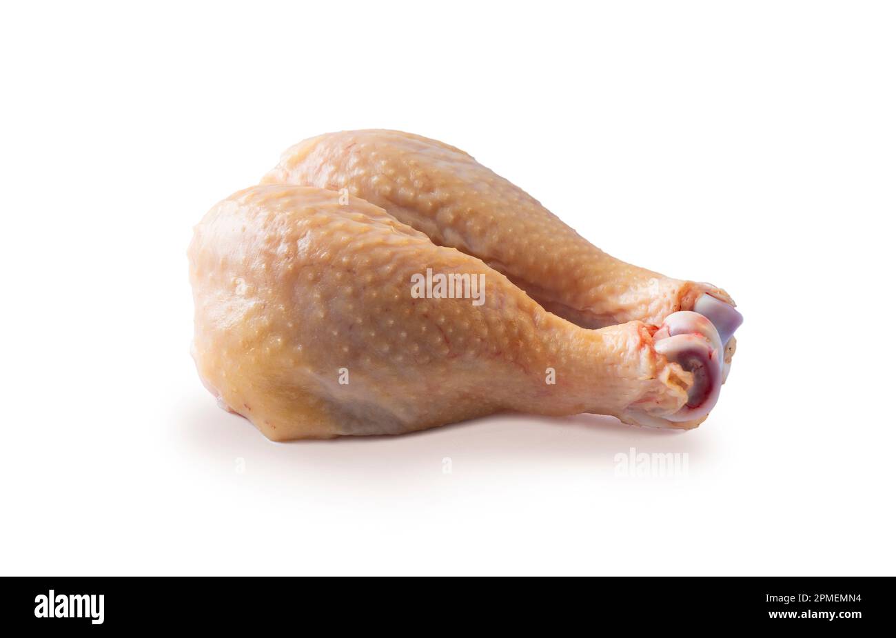 Raw chicken leg piece isolated on white. Raw two chicken legs on white