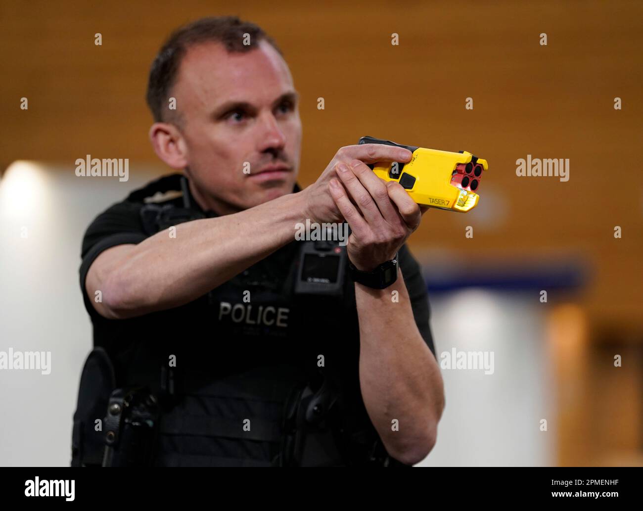 an-officer-demonstrates-the-new-taser-7-as-hampshire-and-isle-of-wight