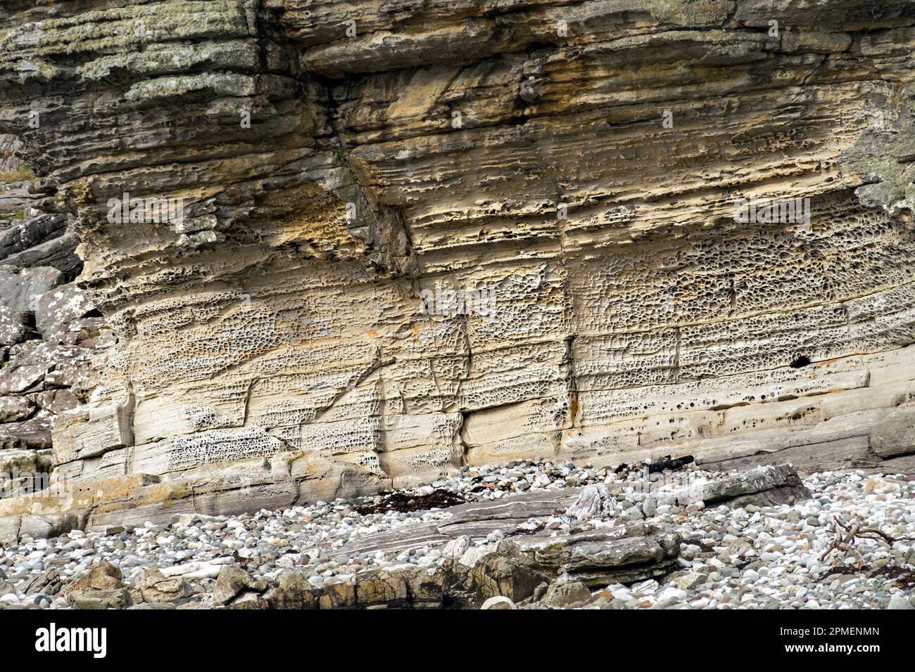 Honeycomb weathered sandstone rock cliffs at Elgol on the Isle of Skye, Scotland, UK Stock Photo