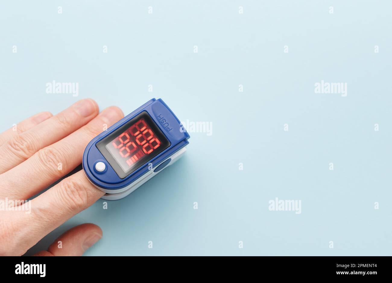 Pulse oximeter measuring oxygen saturation in blood and heart rate ...