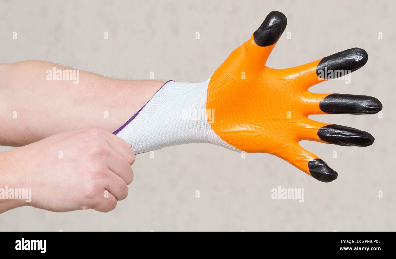 Hands wear protective gloves Stock Photo Alamy