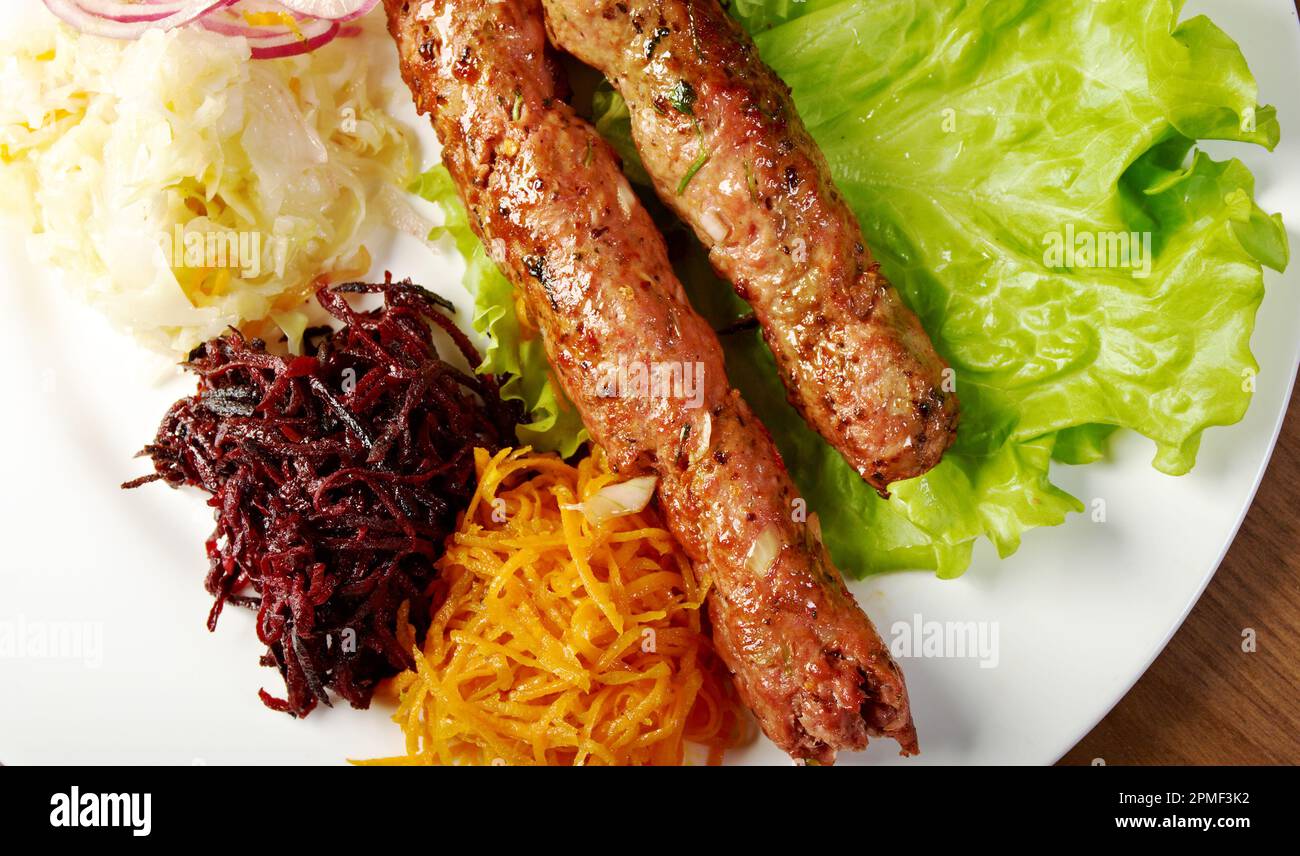 Macedonian Kebapi , are grilled minced meat composed into the shape of