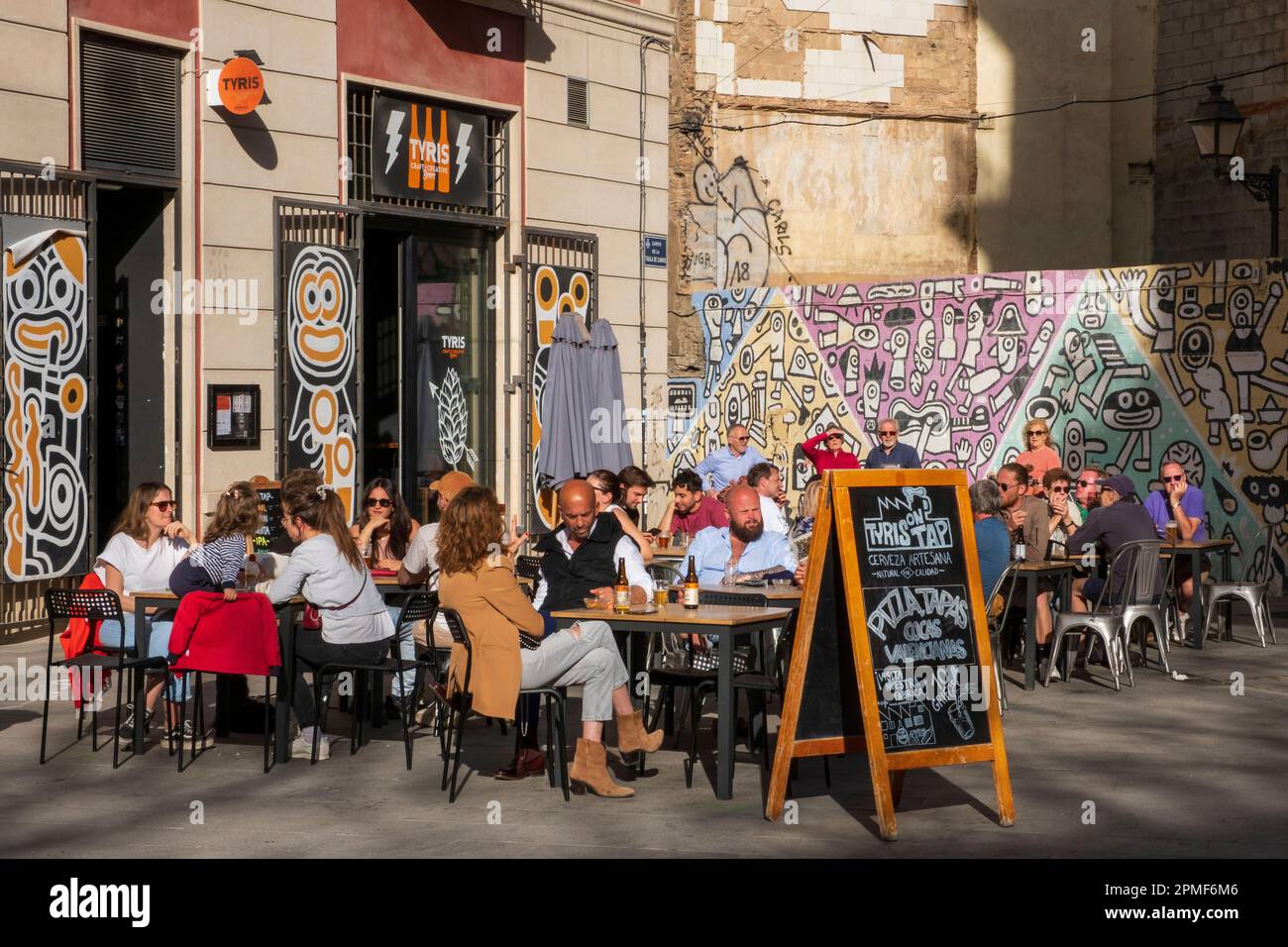 Spain, Valencia, barrio del Carmen, street art, cafe terrace Tyris ...