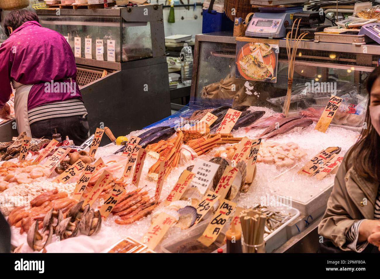 Nishiki market Kyoto, fishmonger fish food stall indoor market, downtown Kyoto,Japan,Asia 2023 Stock Photo