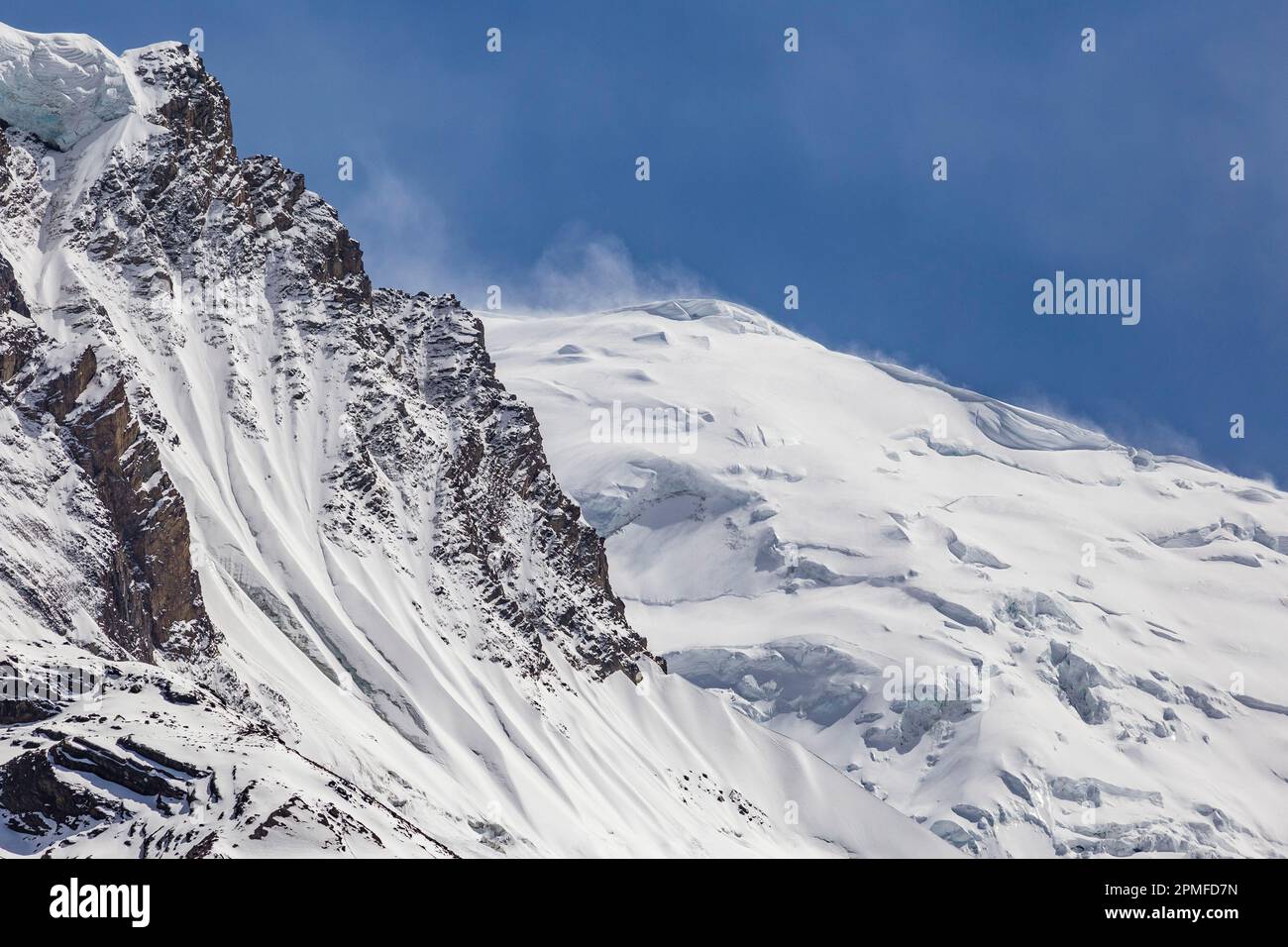 Nepal, Annapurna Conservation Area Project, wind blowing over snow ...