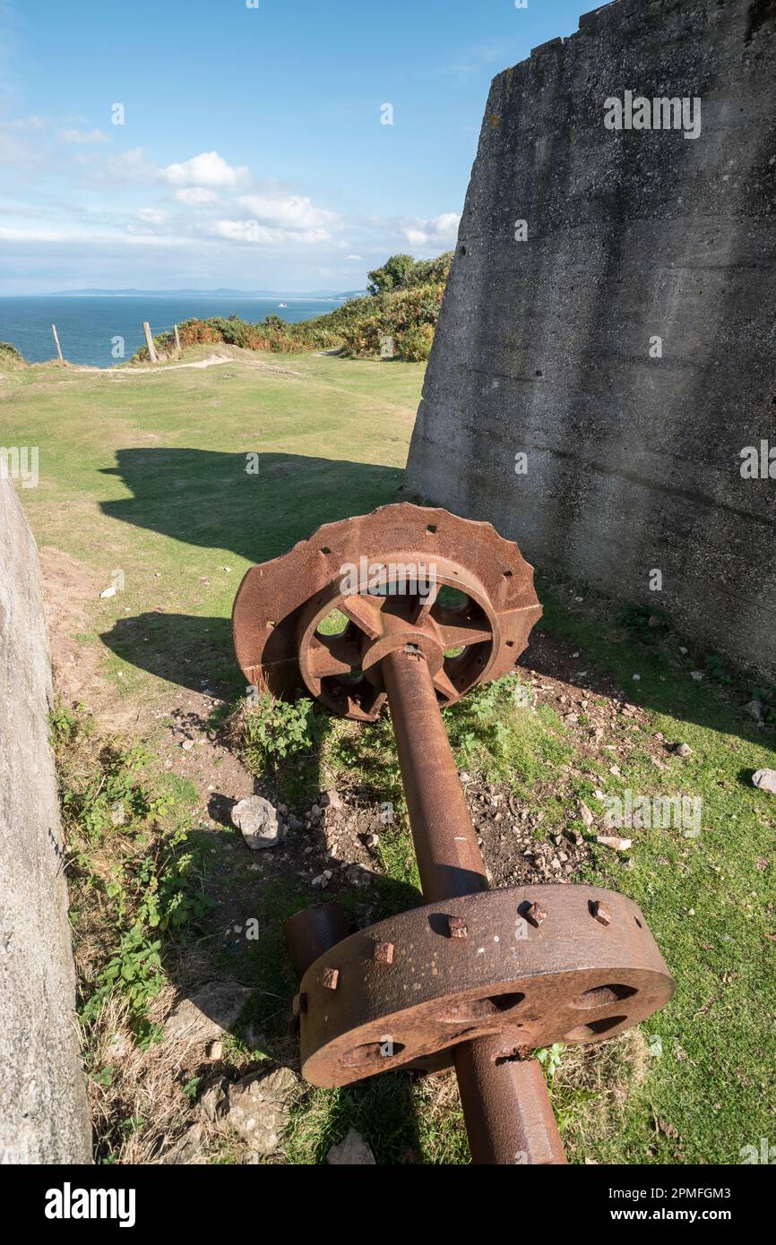 Creigiau Rhiwledyn or Little Ormes Head on the North Wales coast view looking at the Old Quarry pulley winch gear near Porth Dyniewaid Stock Photo