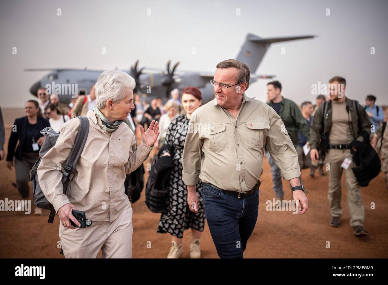 Gao, Mali. 13th Apr, 2023. Boris Pistorius (SPD), Minister of Defense, walks next to Marie-Agnes Strack-Zimmermann (FDP), Chairwoman of the Defense Committee, after arriving in Gao. The German government plans to withdraw the more than 1,100 men and women currently serving in the UN's Minusma mission by May 2024. Credit: Michael Kappeler/dpa/Alamy Live News Stock Photo