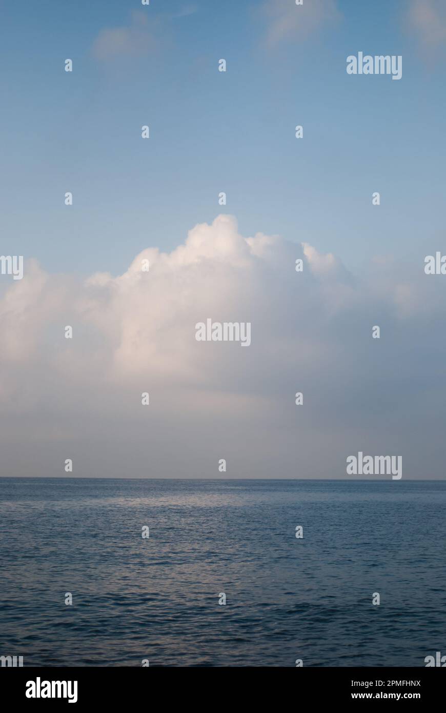 View on white clouds over sea in calm weather Stock Photo