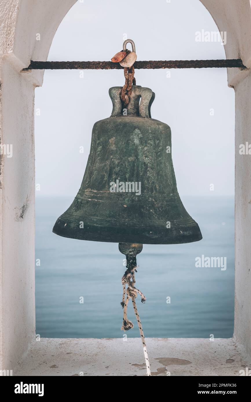 Old bell overlooking Santorini Caldera Stock Photo