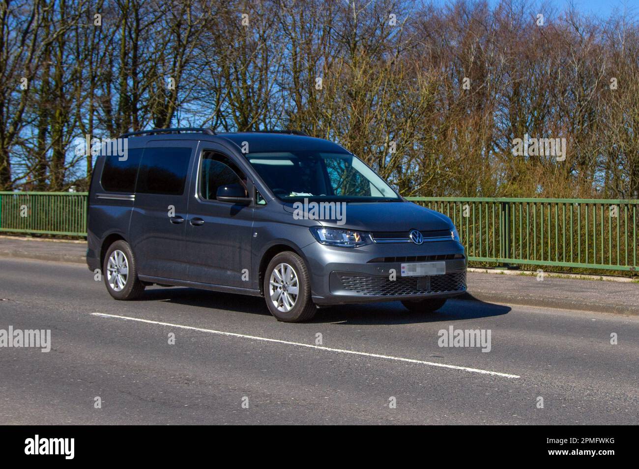 2023 VW Volkswagen Caddy Maxi C20 Life TDi 102 start stop Medium MPV Diesel 1968cc; crossing M61 motorway bridge in Greater Manchester, UK Stock Photo