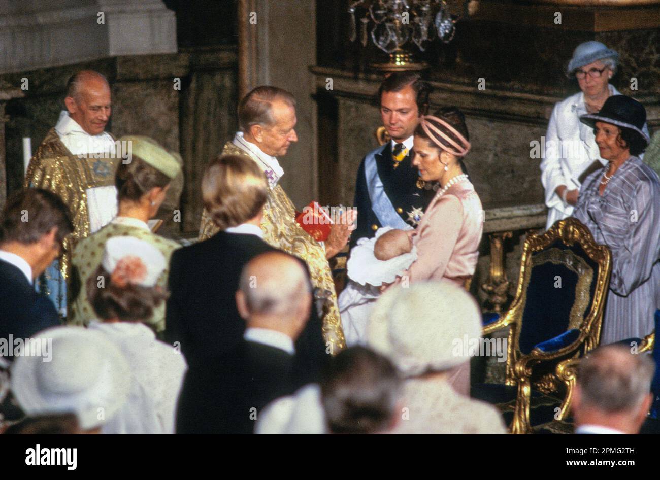 THE BAPTISM OF PRINCE CARL PHILIP in the Palace church in Stockholm Palace.The ceremony was conducted by Archbishop Olov Sundby Stock Photo