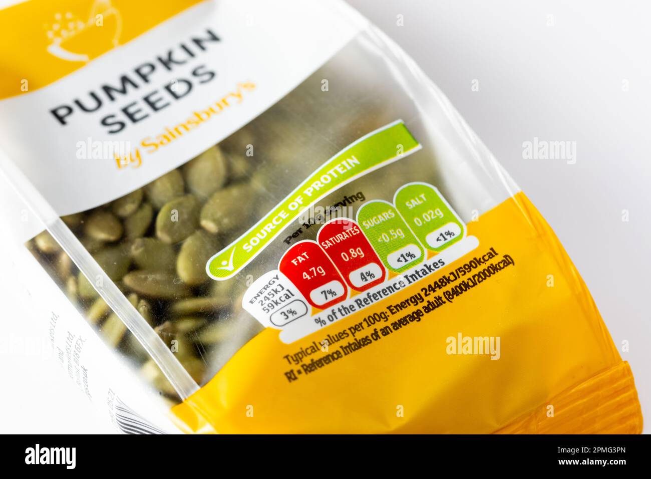 Closeup of the nutritional information on a pack of pumpkin  seeds by Sainsburys. Stock Photo