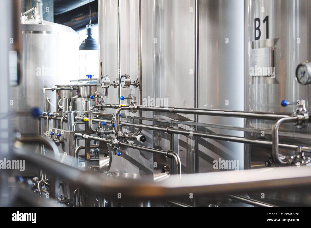 Beer brewing . Commercial brewing equipment close up shot. Industrial