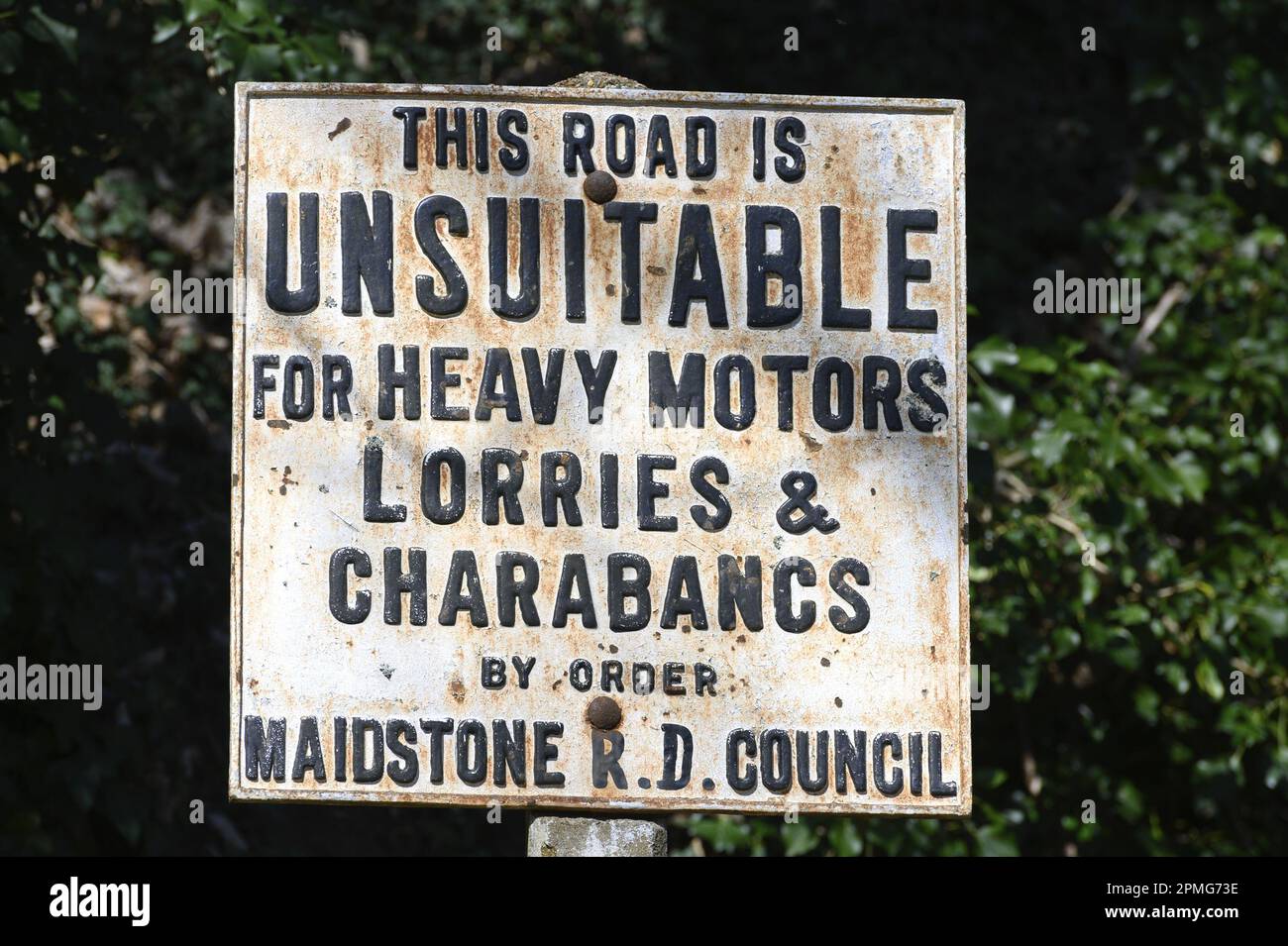 Loose Village, Kent, UK. Old road sign: Unsuitable for Charabancs Stock Photo