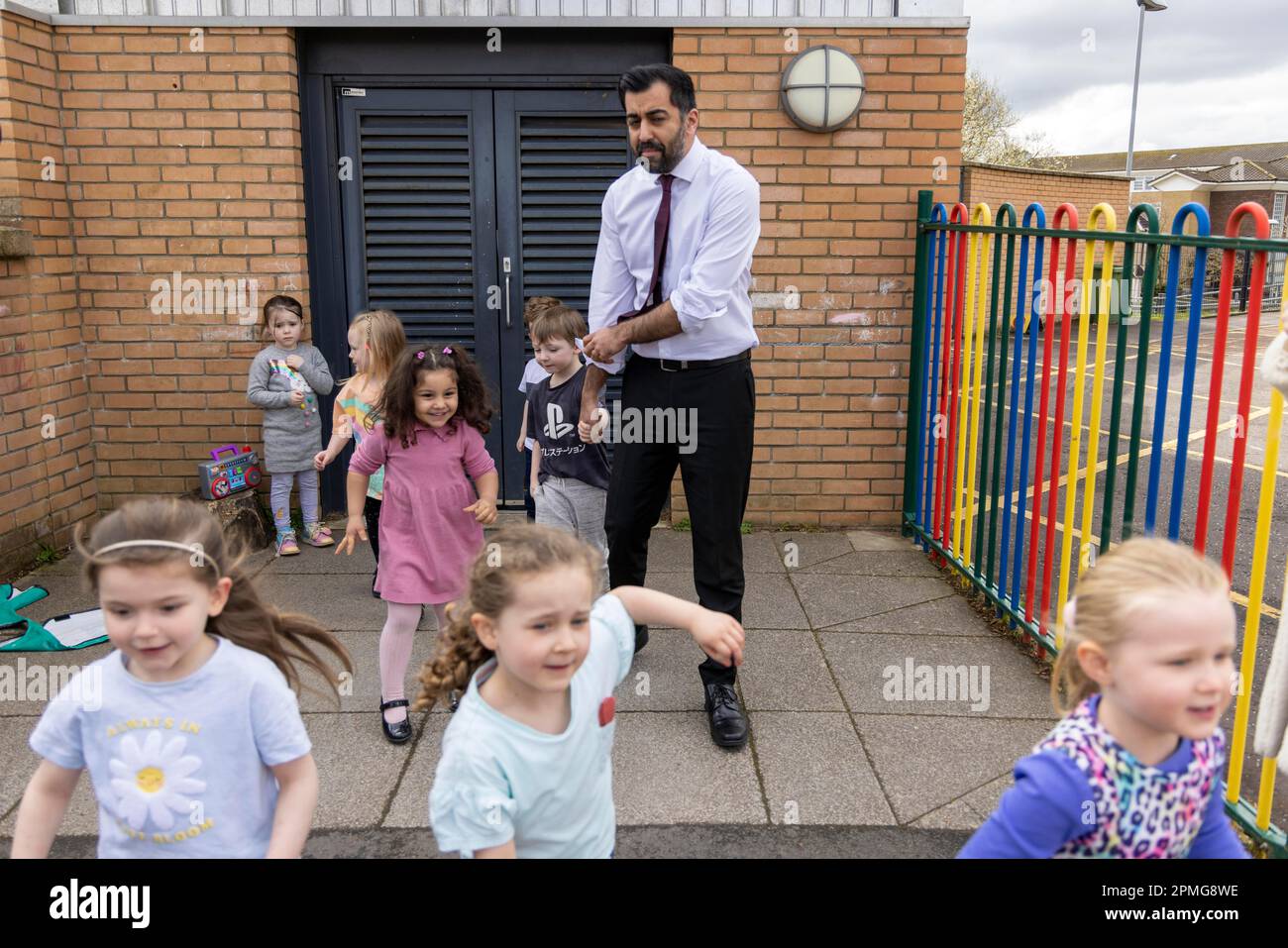 First Minister Humza Yousaf during a visit to a nursery at Crookston Castle Primary School, Glasgow, to see how a project to integrate child poverty interventions and bring services together across the city is having a positive impact for families. Picture date: Thursday April 13, 2023. Stock Photo