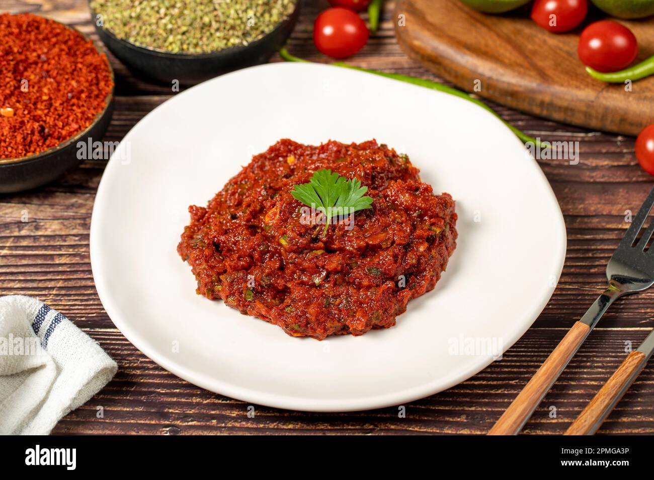 Hot chili peppers harissa sauce. red chili paste or adjika Stock Photo