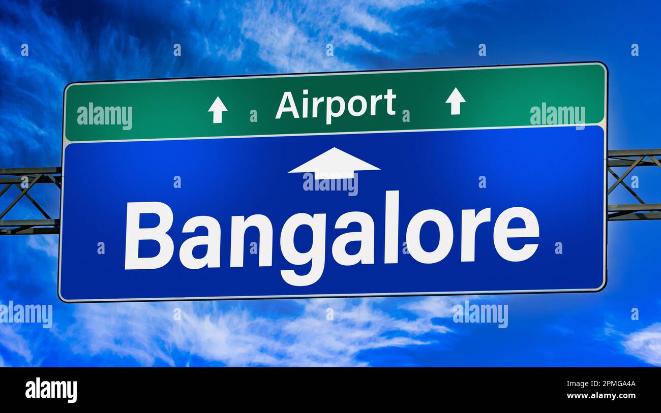 Road sign indicating direction to the city of Bangalore Stock Photo Alamy