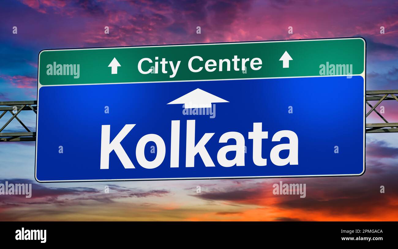 Road sign indicating direction to the city of Kolkata Stock Photo Alamy