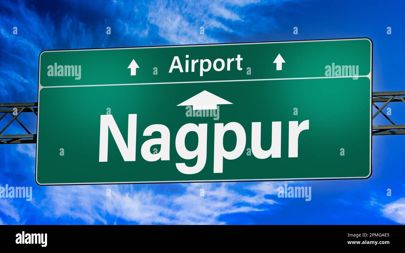 Road sign indicating direction to the city of Nagpur. Stock Photo