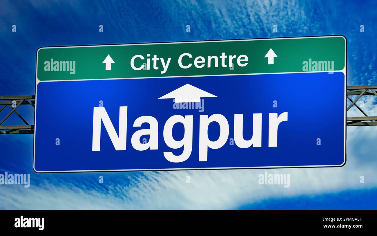 Road sign indicating direction to the city of Nagpur. Stock Photo