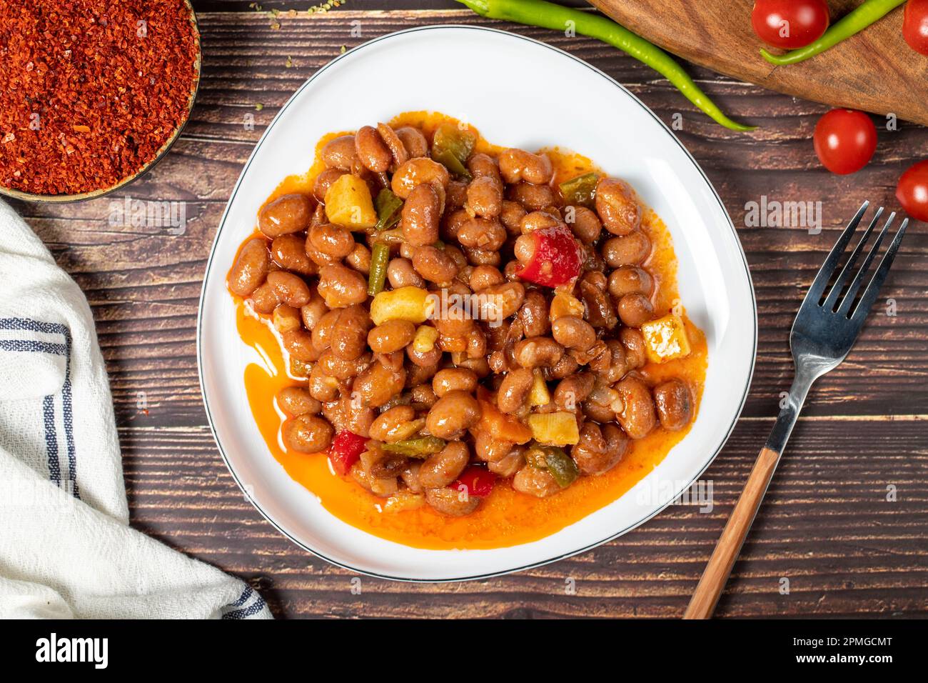 Kidney beans dish with olive oil on wood floor. Healthy foods. Aegean