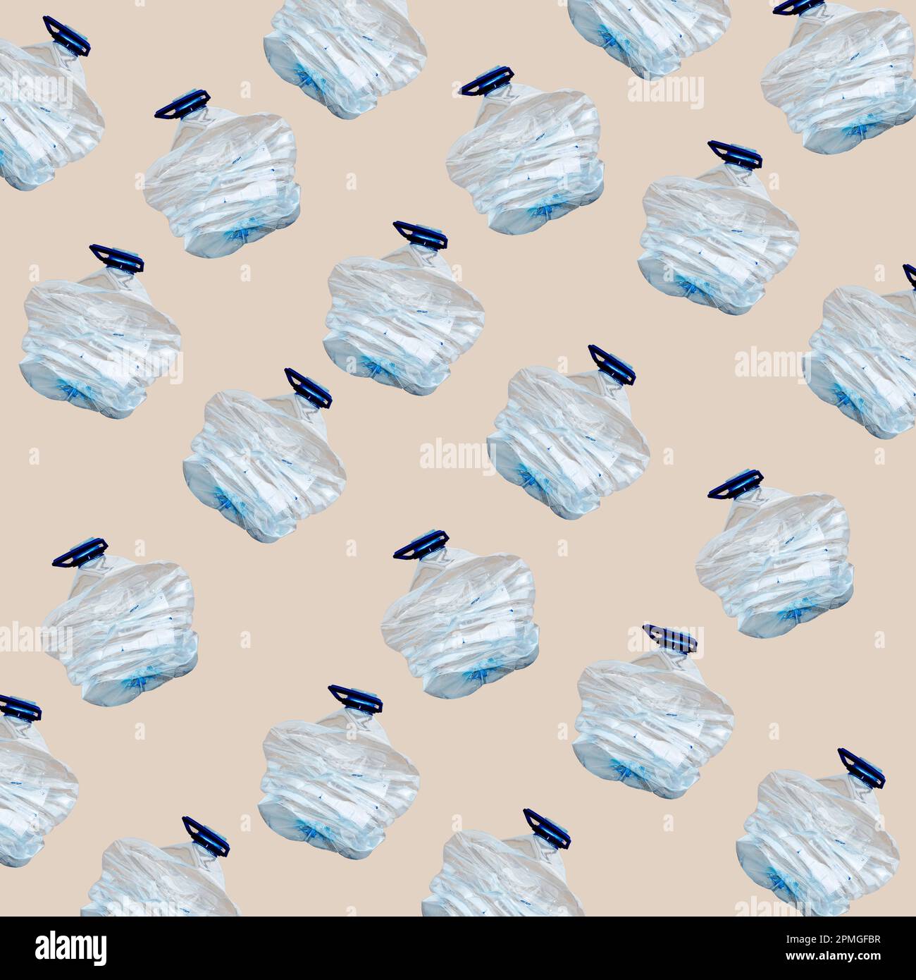 some smashed used plastic bottles on a beige background Stock Photo