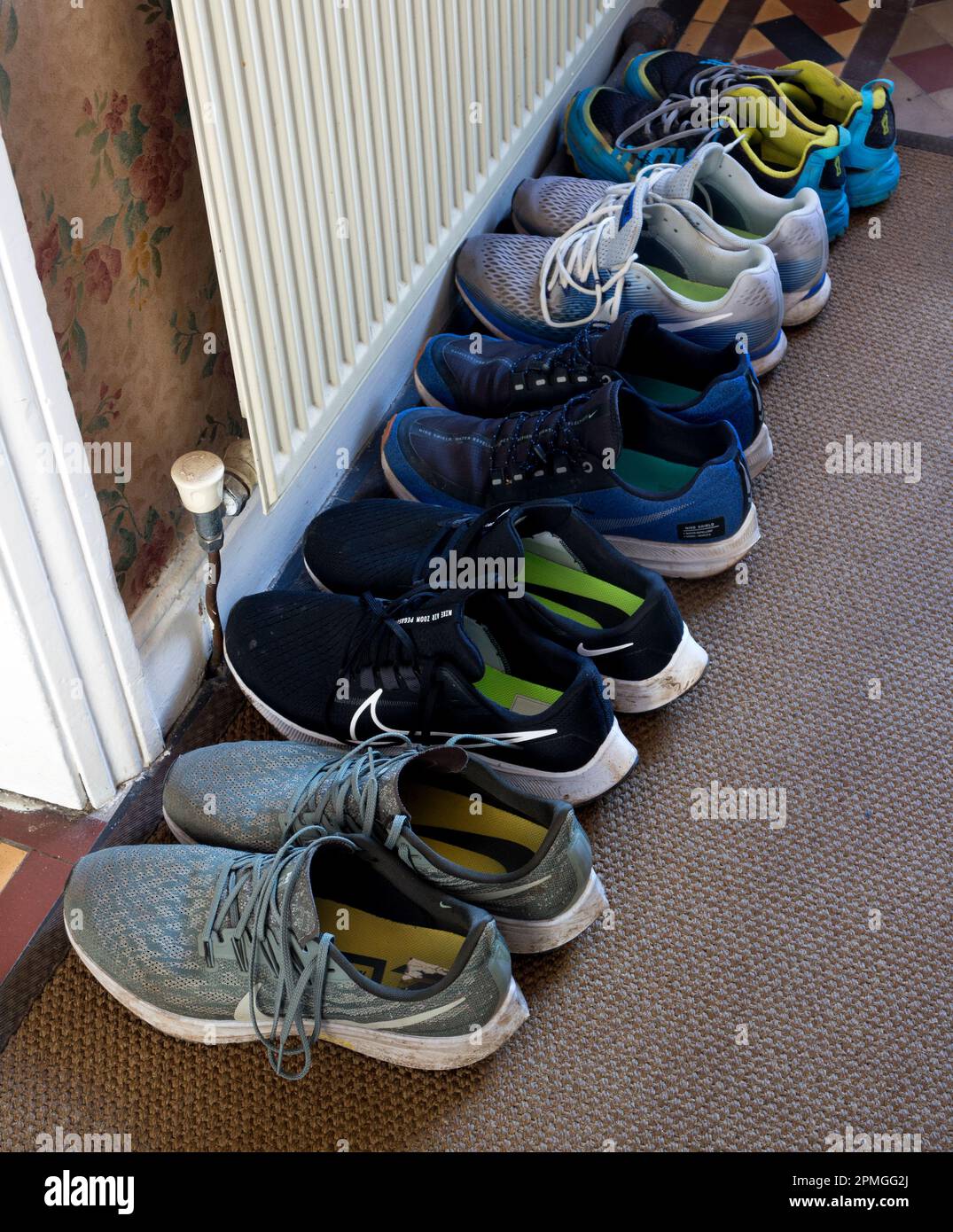 Running shoes in the hall of a house. Stock Photo