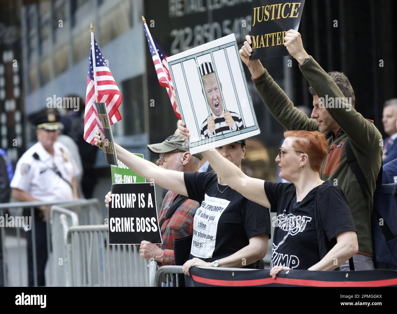 New York, United States. 13th Apr, 2023. Protesters stand behind police barricades outside off the office of New York Attorney General Letitia James before the arrival of former US president Donald J. Trump in New York City on Thursday, April 13, 2023. Donald Trump will arrive for a deposition on Thursday in the civil lawsuit with AG Letitia James. Last week Donald Trump was indicted by a Manhattan grand jury led by Manhattan District Attorney Alvin Bragg on more than 30 counts related to business fraud. Photo by John Angelillo/UPI Credit: UPI/Alamy Live News Stock Photo