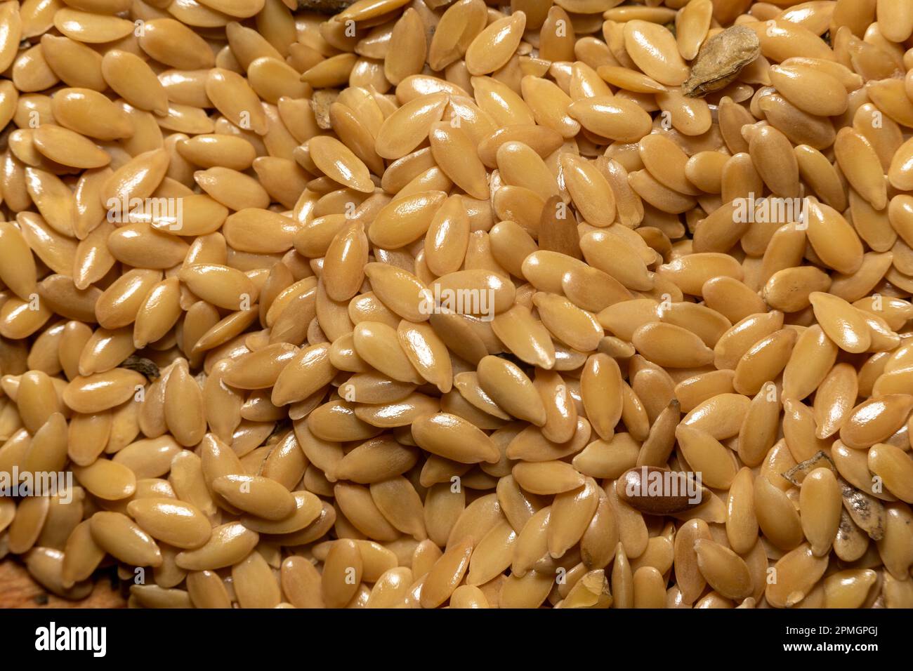 Flax seeds texture, extreme close-up. Macro photo. View from above