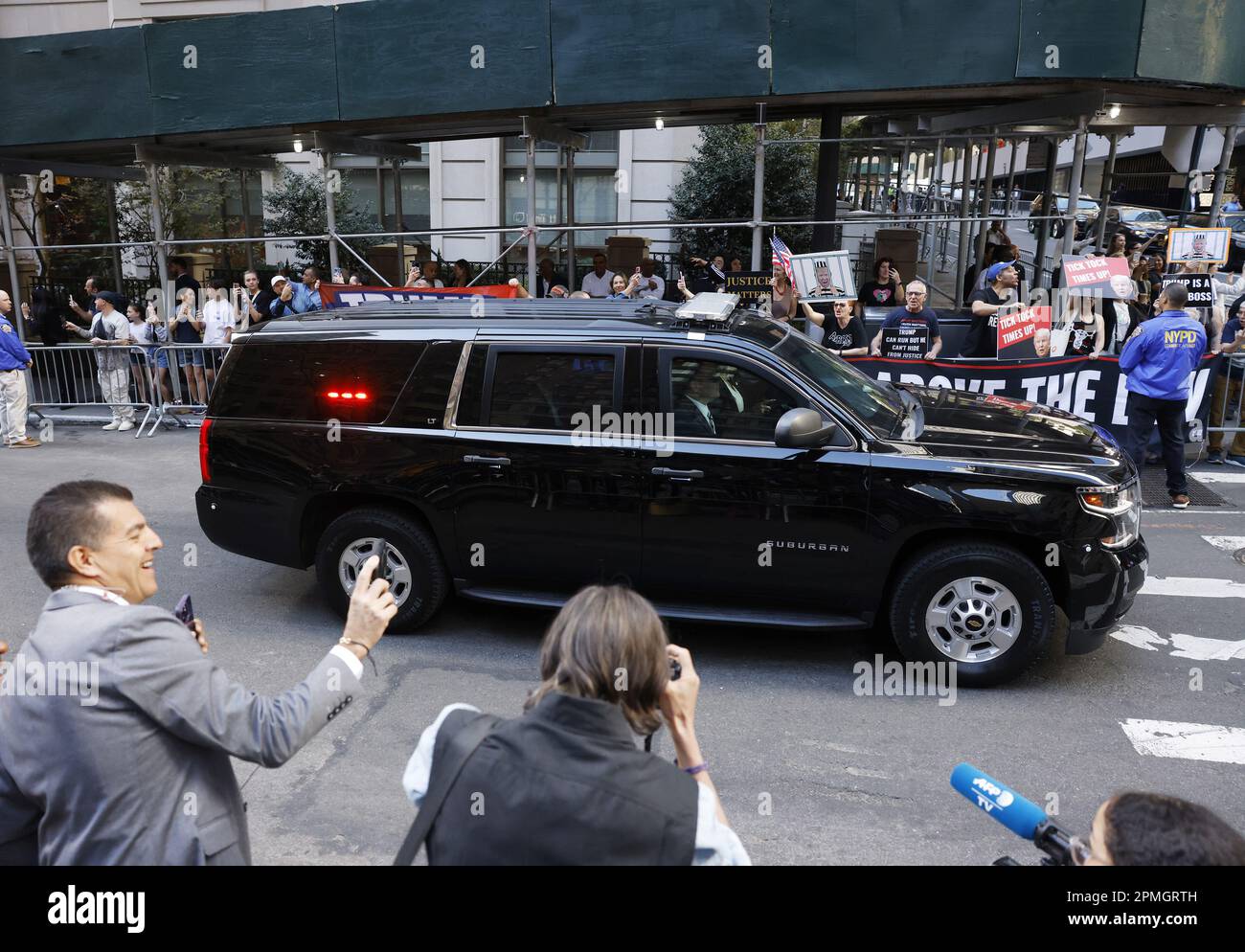 New York, United States. 13th Apr, 2023. Protesters watch as the