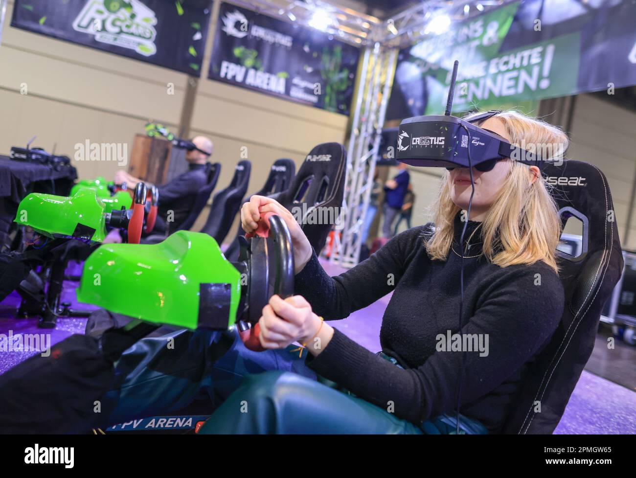 Leipzig, Germany. 13th Apr, 2023. A visitor to the "CAGGTUS" gaming