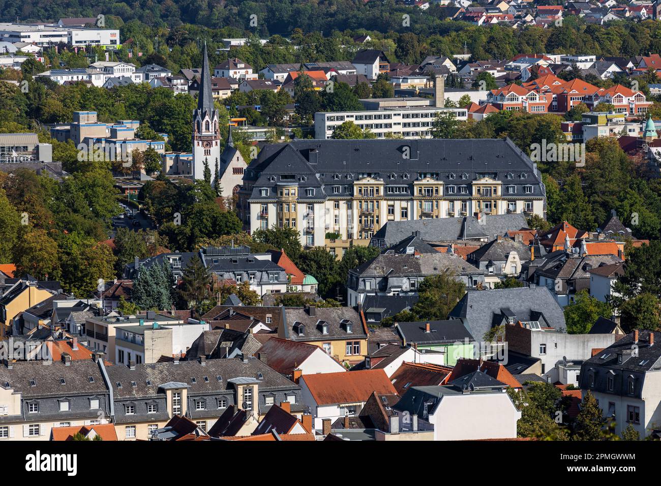 cityscape of spa town Bad Nauheim, Hesse, Germany, view to catholic Saint Bonifatius chruch and the former Grand Hotel Stock Photo