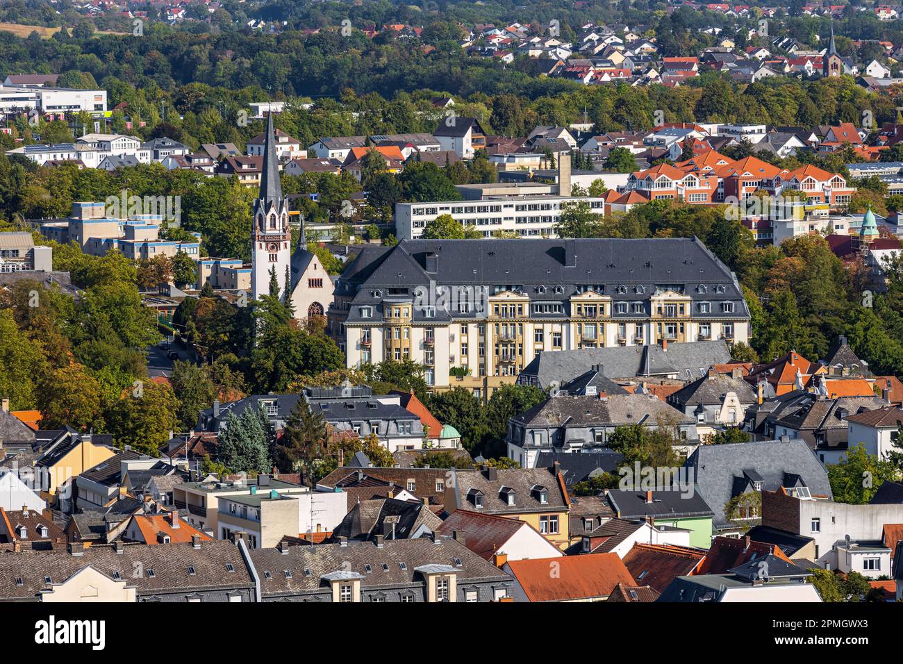 cityscape of spa town Bad Nauheim, Hesse, Germany, view to catholic Saint Bonifatius chruch and the former Grand Hotel Stock Photo